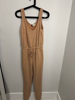 FREE PEOPLE BEACH JUMPSUIT. XS. Orange.